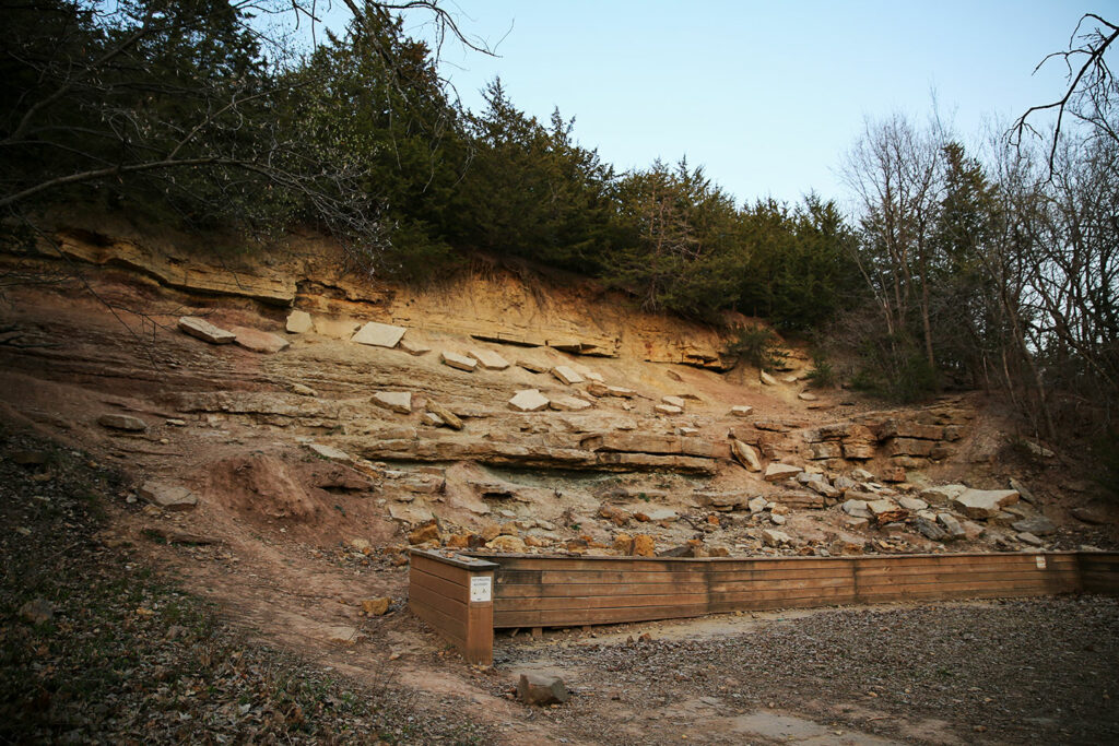 a geologic exhibit is on display at the park showcasing limestone and shale