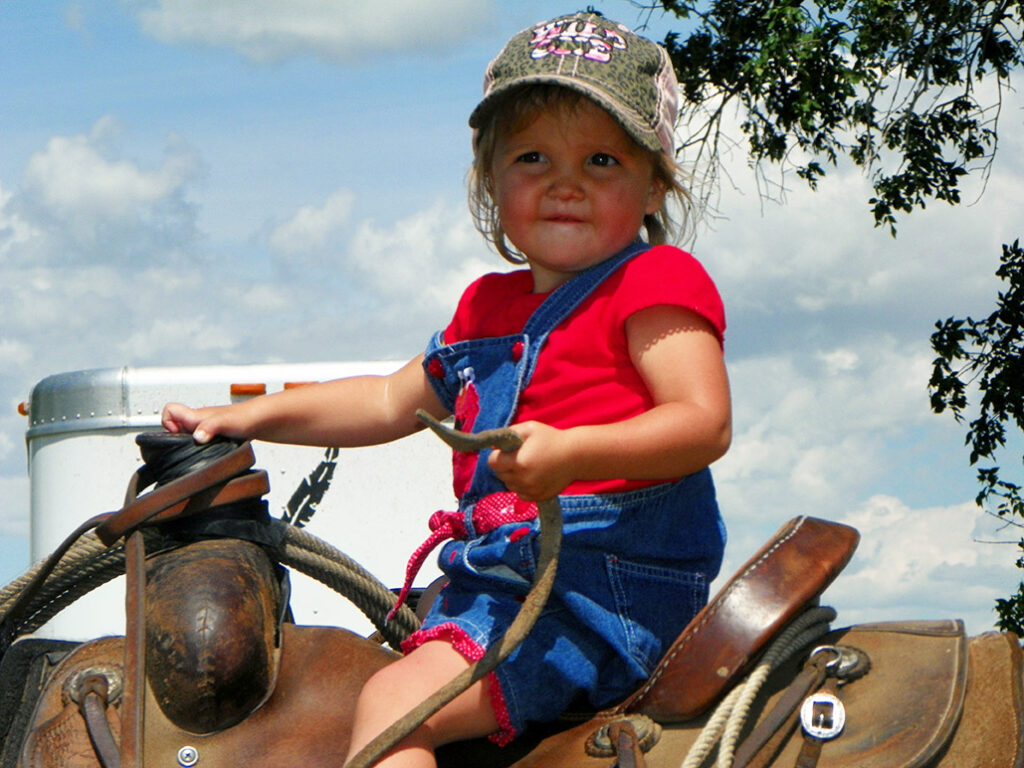 a young girl on horseback