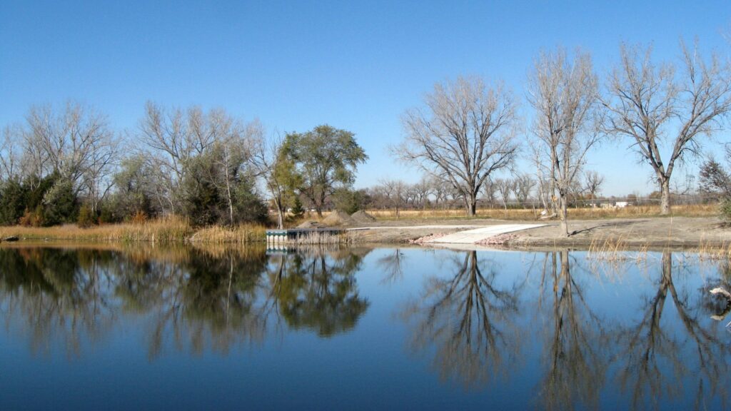 Fishing dock and boat ramp at a pond near Maxwell, NE.