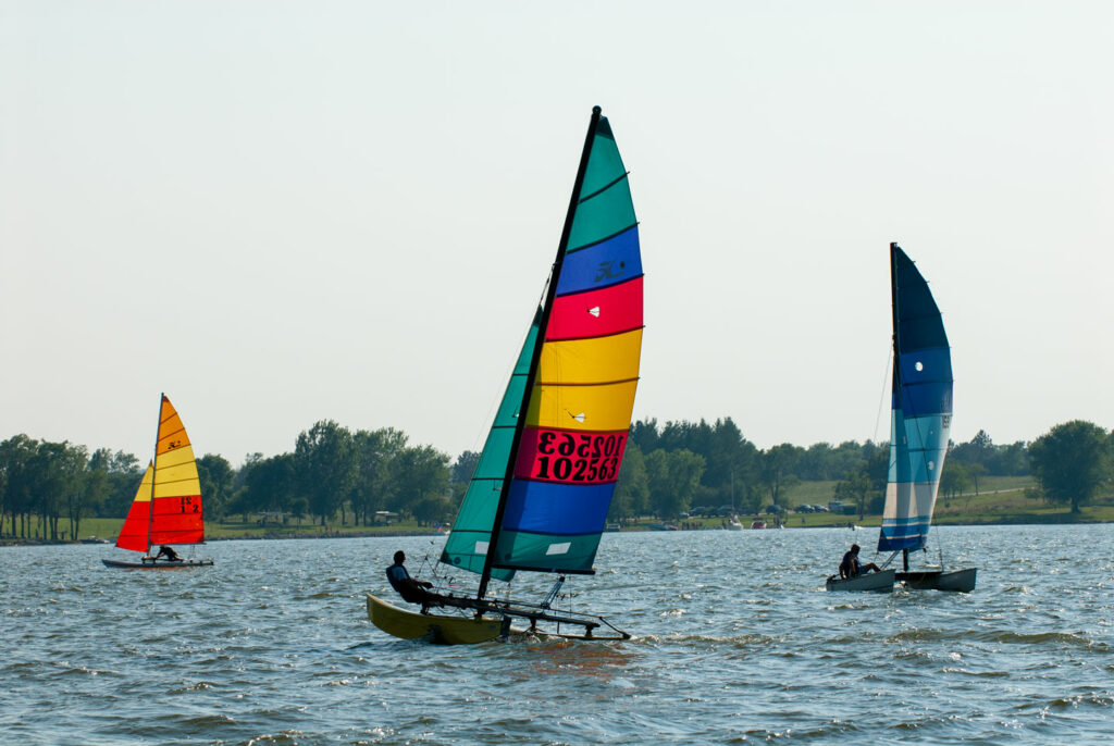 Three catamarans sailing at Branched Oak State Recreation Area.