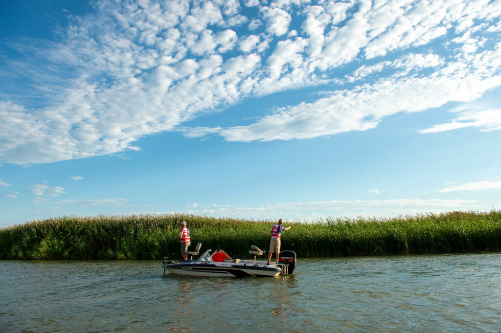 Two high school anglers on a competition fish boat