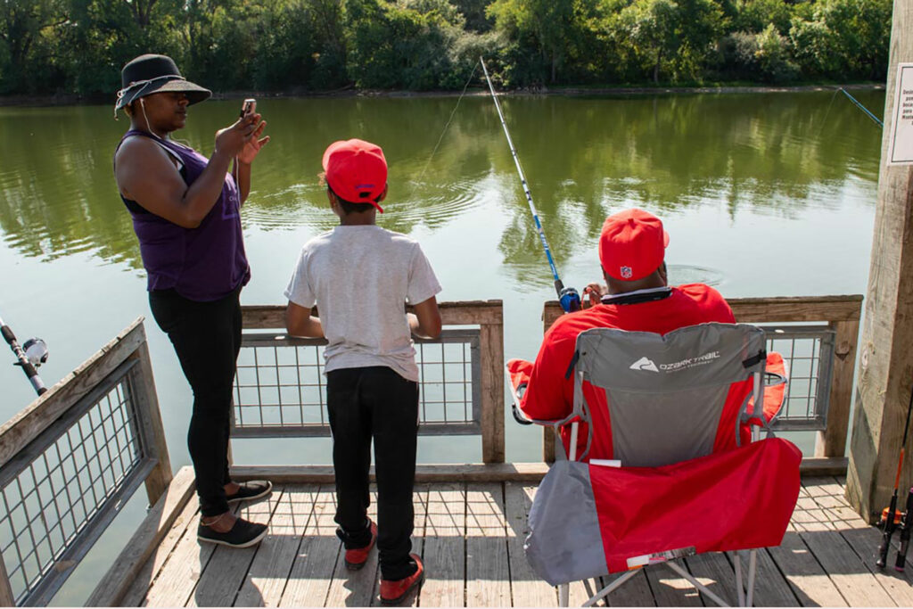 Anglers fish from an accessible deck on Lake 2 at Louisville State Recreation Area.