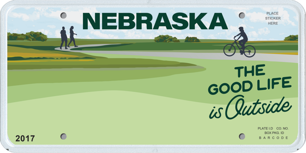 Nebraska license plate with a graphic of green landscape and text "The Good Life is Outside"