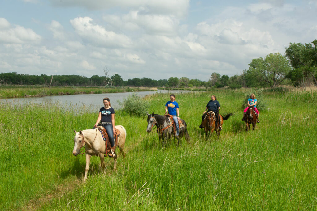 Trail rides at Buffalo Bill Ranch State Recreation Area. Trail rides are offered by Dusty Trails at the SRA. Photo by Julie Geiser.