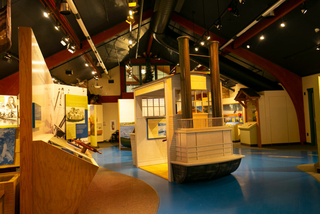 A replica, truncated steam boat and museum displays.