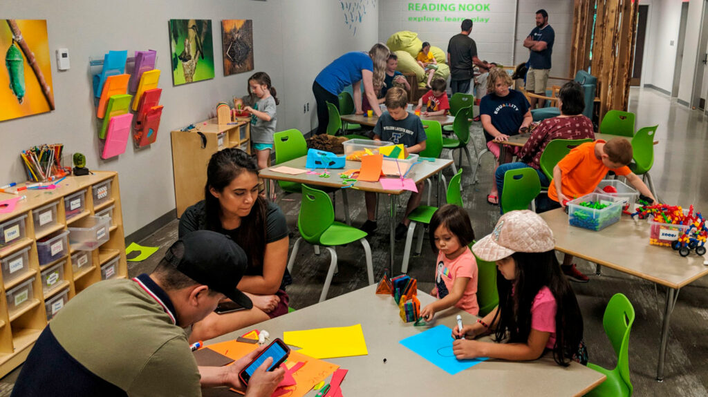 families do crafts together in the maker's space