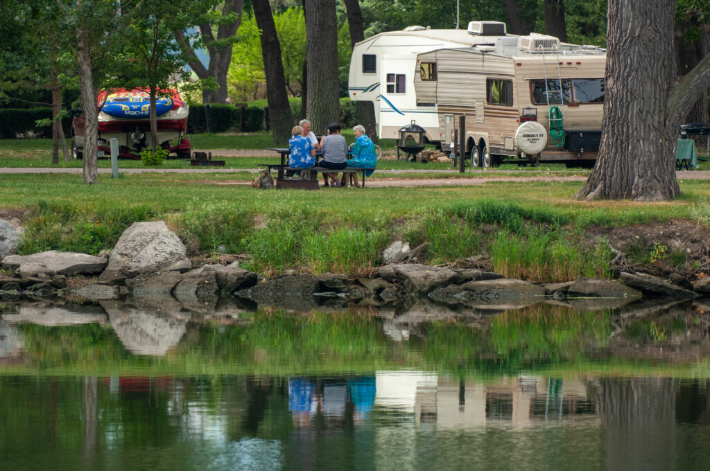 Visitors spend time around their campers at Lake Ogallala SRA.