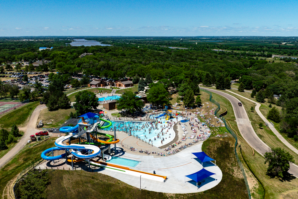 Aerial view of the aquatic center at E.T. Mahoney State Park in Nebraska on a busy summer day.